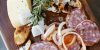 Mortadella al tartufo, caciotta, cipolline grigliate e miele